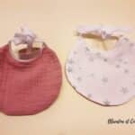 Bavoir poupée étoiles argentées