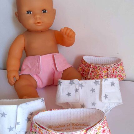 Couche poupée rose et blanche