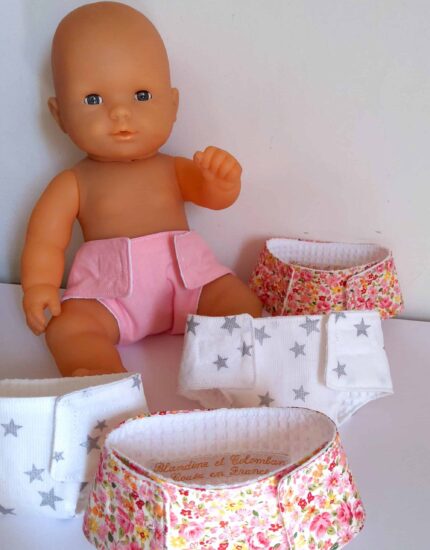 Couche poupée rose et blanche